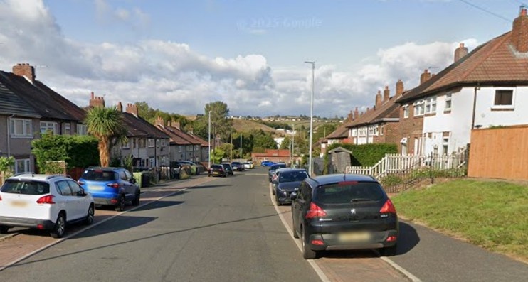 Street view of a side street in Dalton. Airport Taxi Huddersfield.