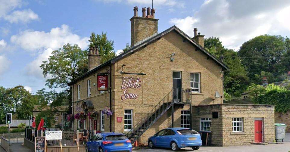 Street view of the White Swan in Highburton. Airport Taxi Huddersfield.